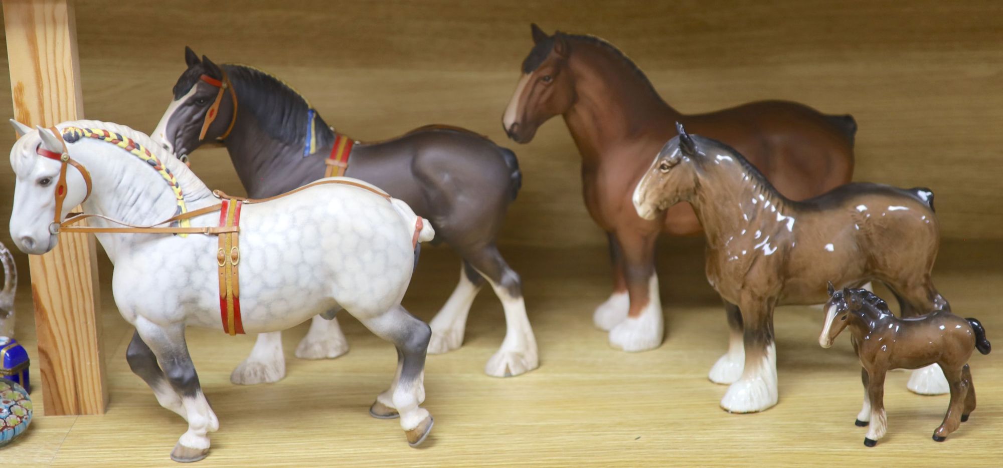 Five Beswick shire horses and a foal